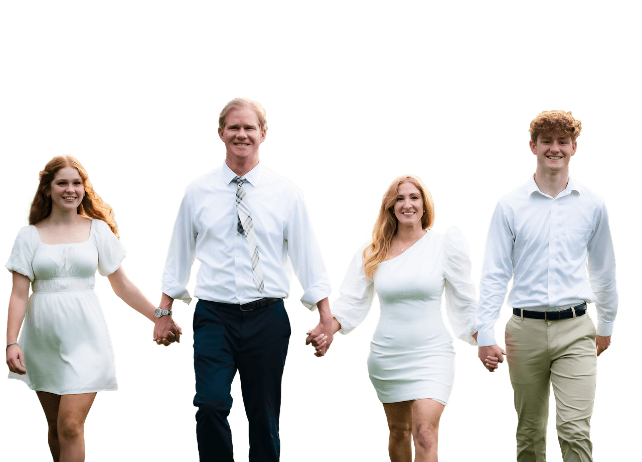 Holden Hoggatt with family holding hands